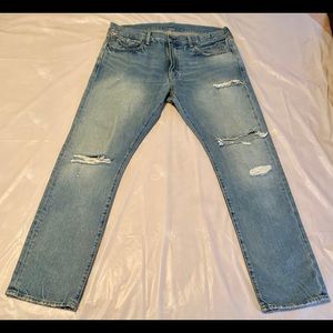 Ralph Lauren ripped and trendy light blue jeans.